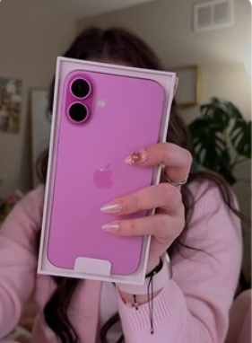 woman holding refurbished iPhone woman holding refurbished iPhone